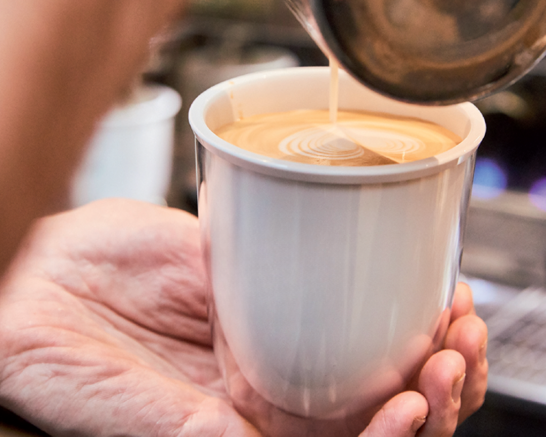 White uppercup with a flatwhite 