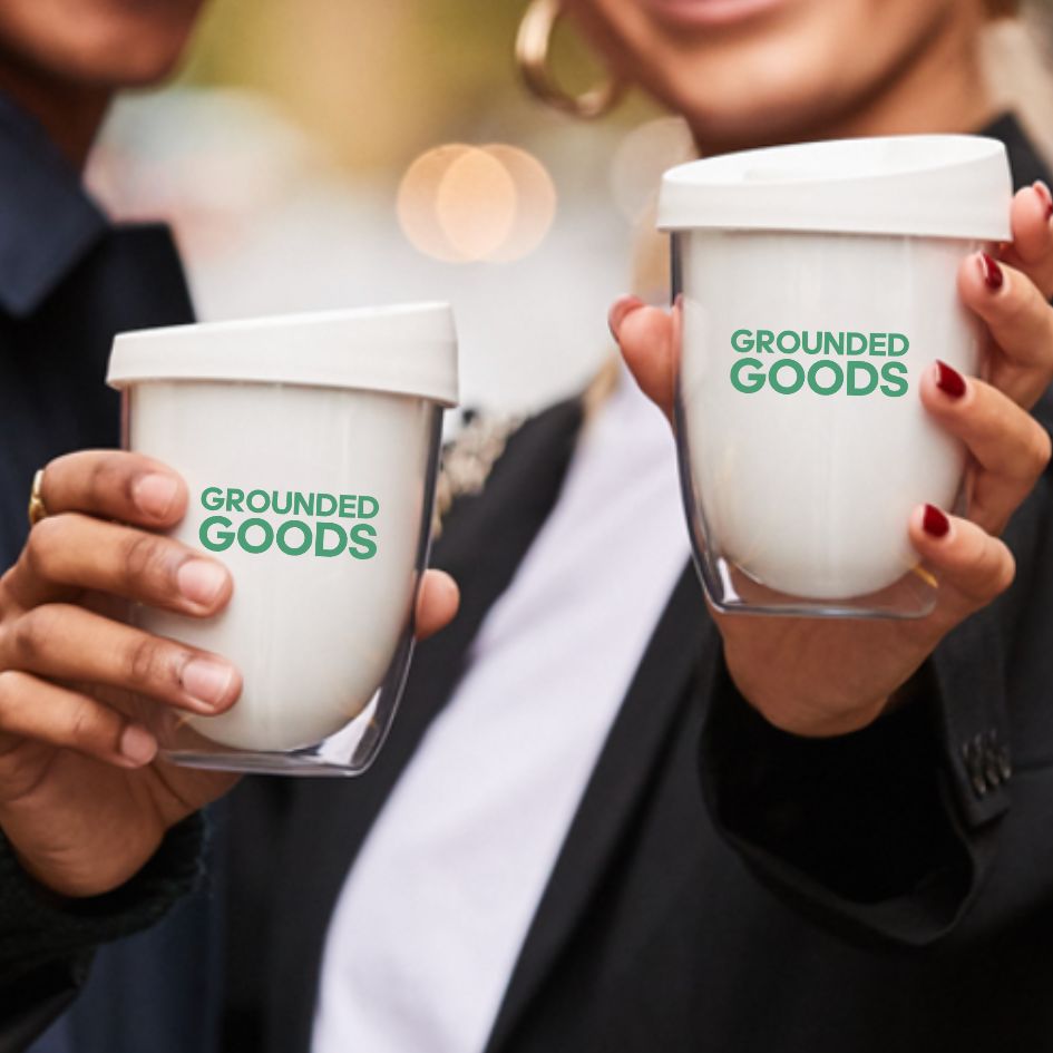 "Image of a co-branded Grounded Goods Uppercup, showcasing customisable, eco-friendly merchandise options for businesses seeking sustainable brand partnerships